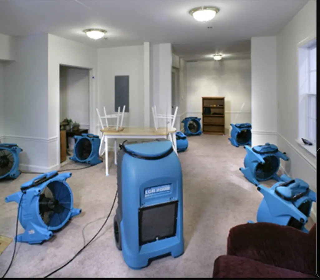 Air movers and dehumidifier setup for Water Damage Restoration in Berthoud